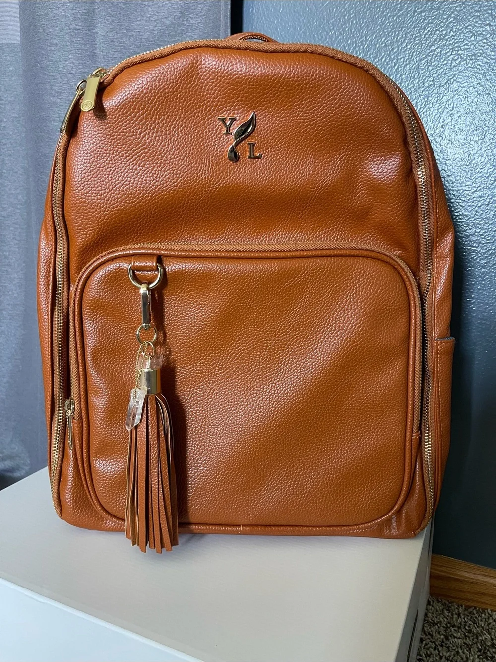 Young Living Cognac Brown Backpack with Tassel Charm